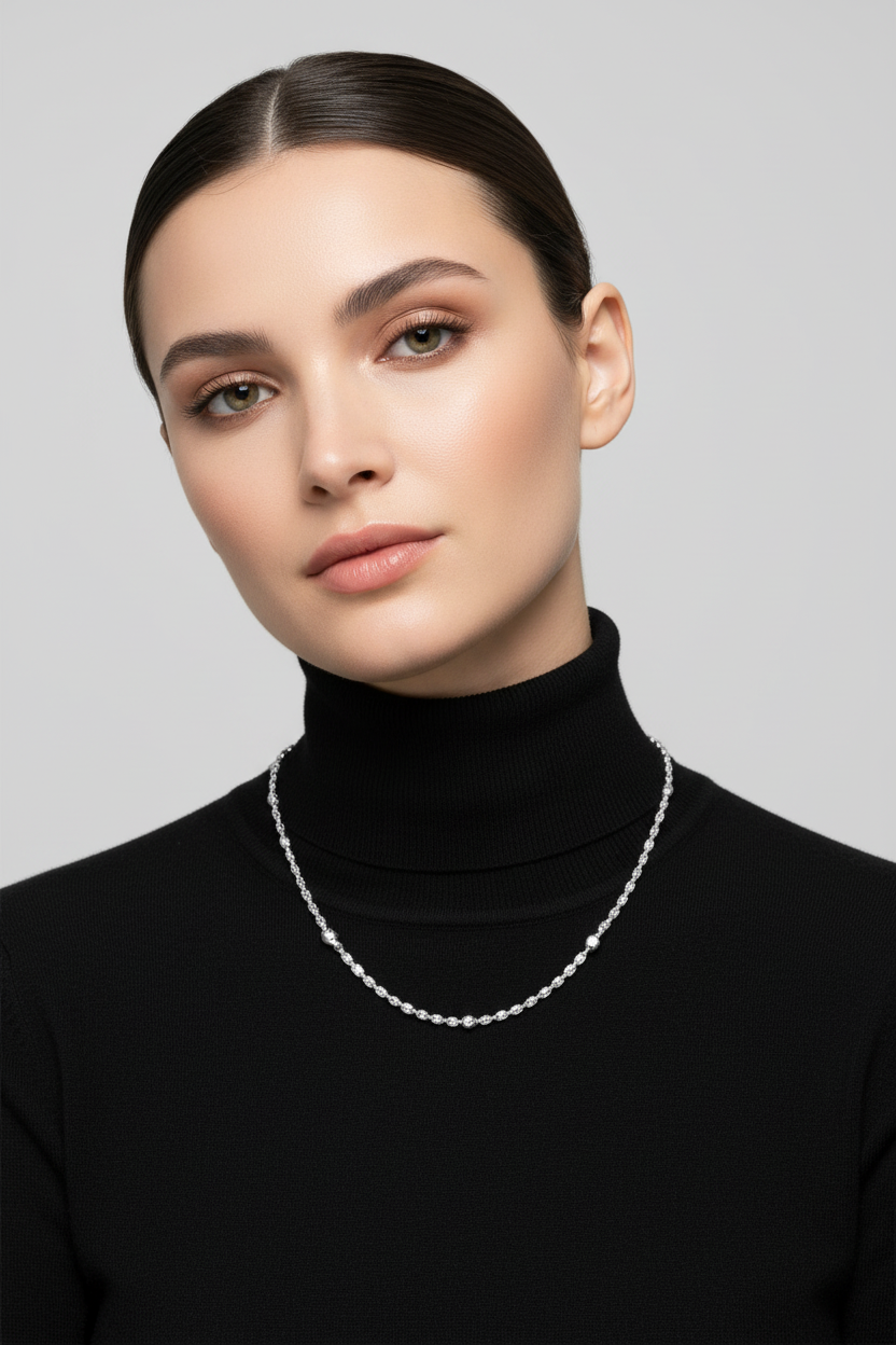 Female Model in Black Turtleneck - White Gold Necklace