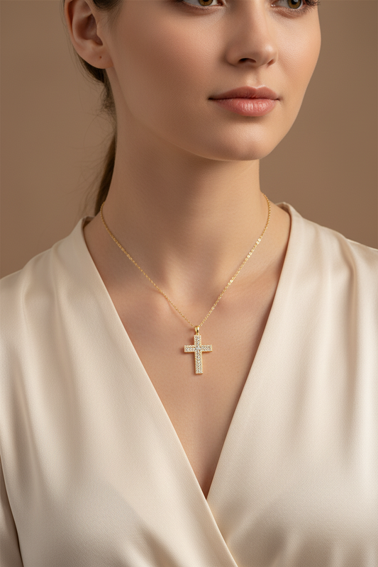 Female Model in Cream Silk - Yellow Gold Cross